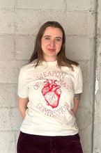 Load image into Gallery viewer, KCK Weapon Of Mass Compassion Unisex Tee- Red Ink
